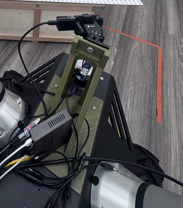 Custom pan-tilt neck carrying a stereo camera
